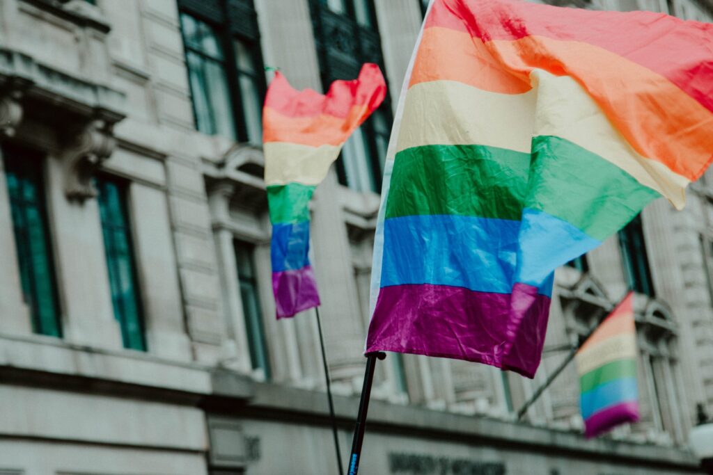 lgbt+ pride flag flying in the sky