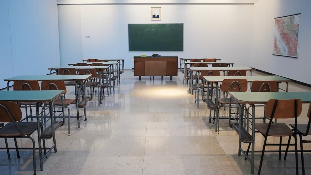 row of desks in classroom