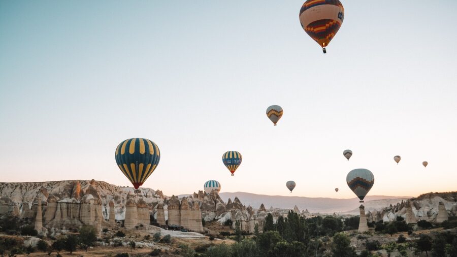 Image of Turkey hot air balloons and village