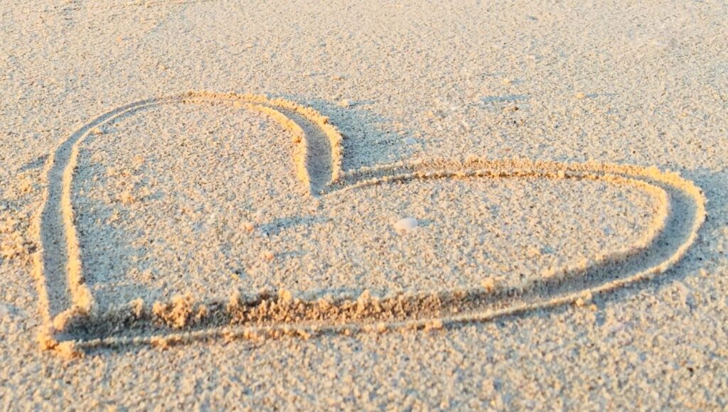 Heart drawn in the sand