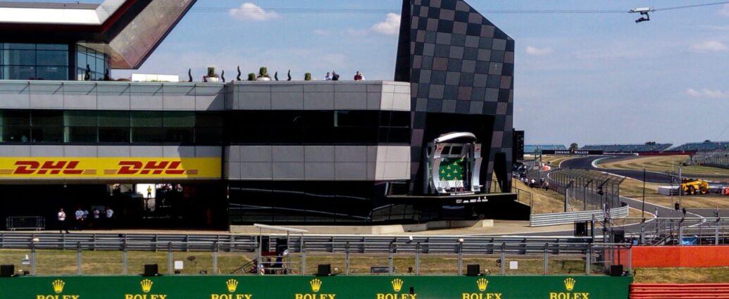 The pitlane entrance, starting grid and podium at Silverstone motor racing circuit during the British Grand Prix. Since this year's Silverstone, it has been announced that Daniel Ricciardo has returned to the full line up!