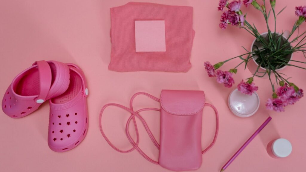 a selection of pink items, including a hot pink pair of crocs