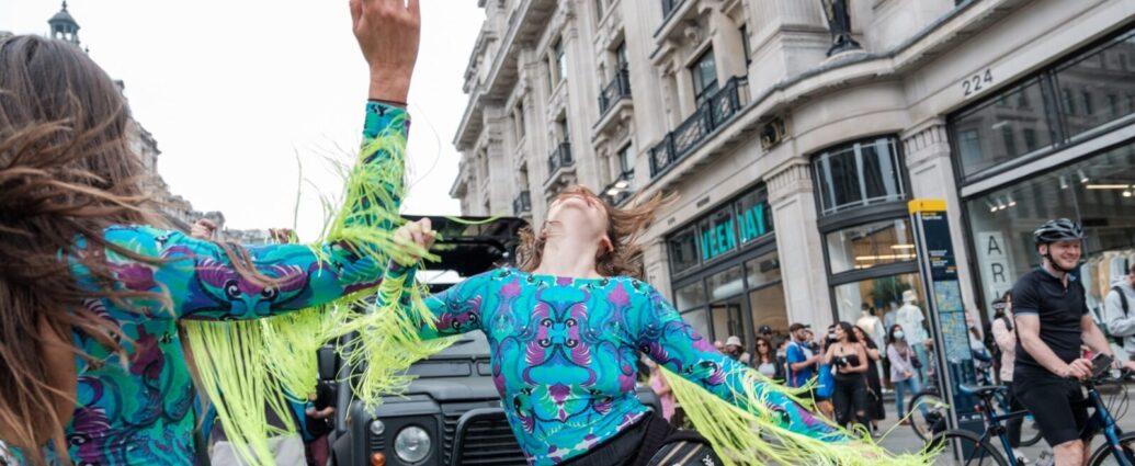 Two women partying on the street