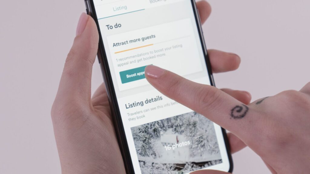 Image of Airbnb app on phone.