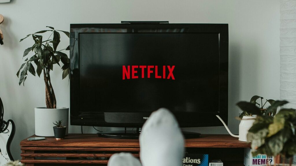 Image shows television screen that reads 'Netflix' [movie night treats]