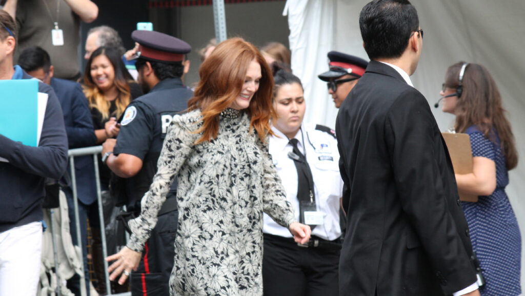 Actress Julianne Moore leaving a press conference at TIFF [May December]