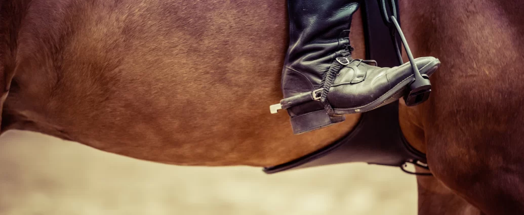 horse rider's boot in the stirrup