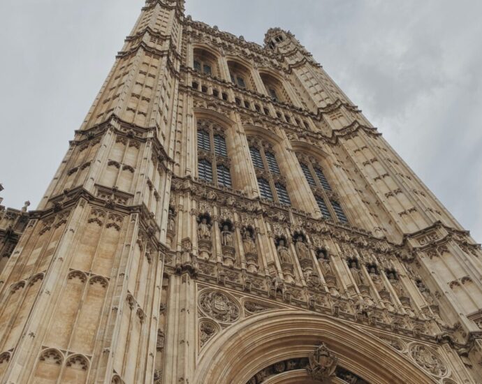 The Palace of Westminster against a cloudy sky. With the UK electing its first atheist Prime Minister, is it time we reassessed the relationship between politics and religion in Westminster?