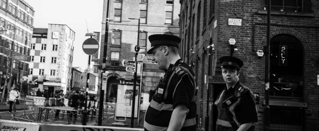 Black and white image of Manchester Police. Far-right violence