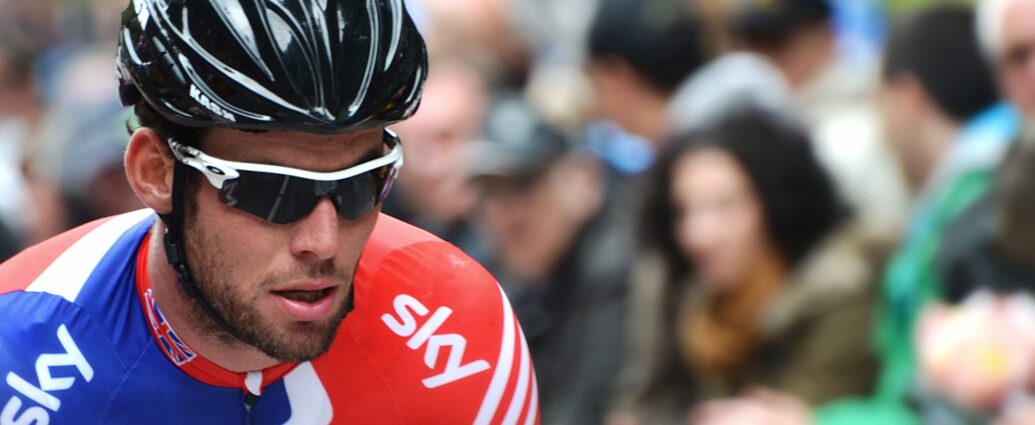 Mark Cavandish in lycra and helmet cycling