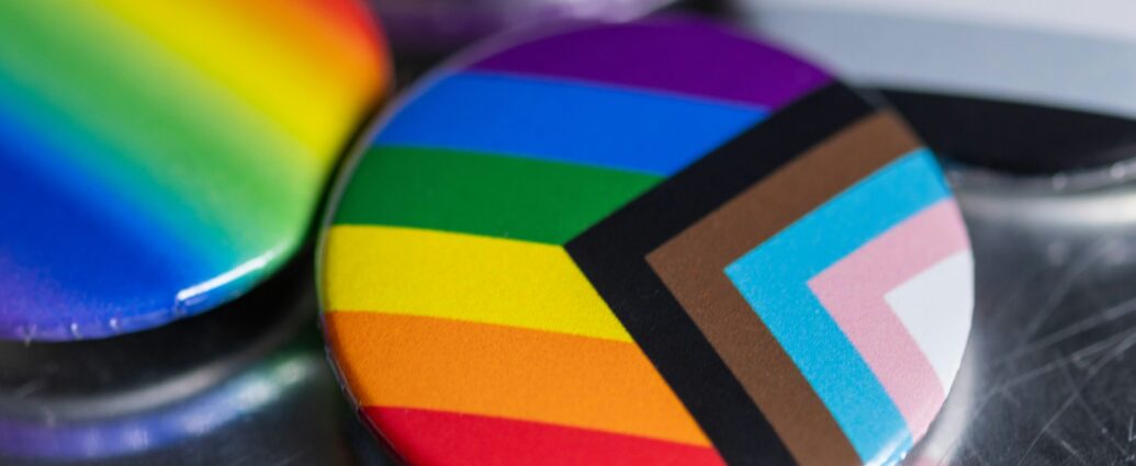 colourful LGBT flag on badge