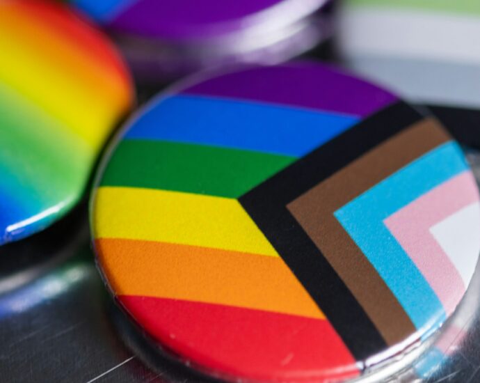 colourful LGBT flag on badge