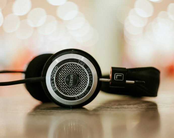 selective focus photo of black headphones.