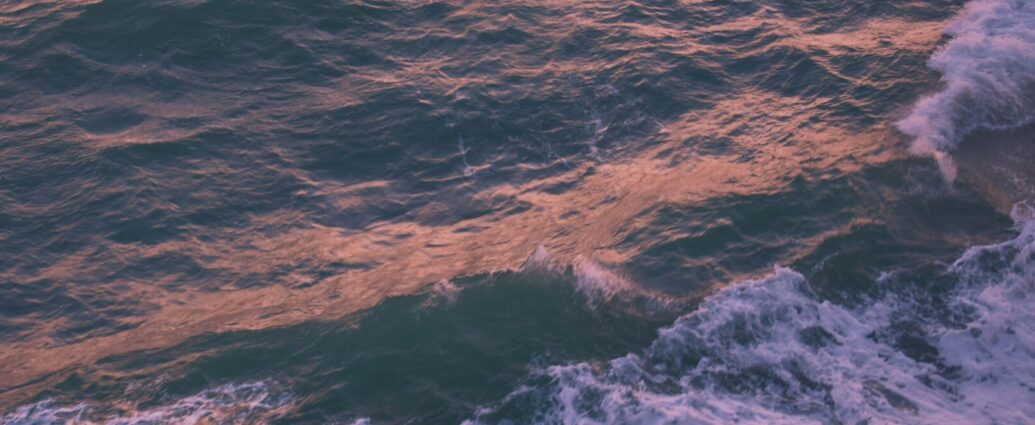 Close up image of the blue-grey ocean with white swell. Labour's plans