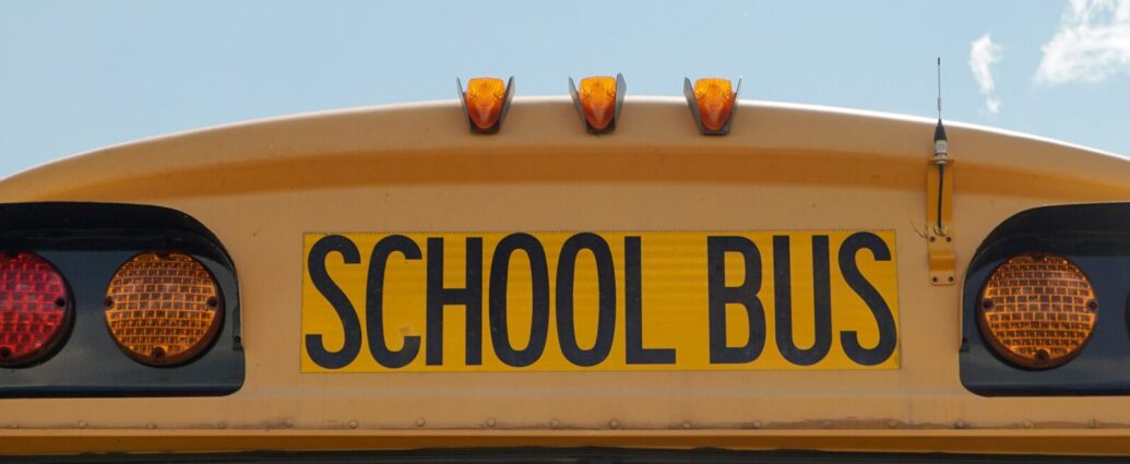 Featured image of a yellow school bus with school bus in black writing.