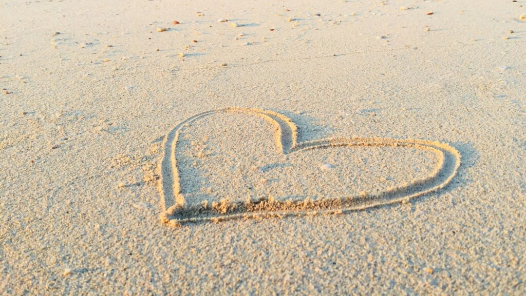 heart drawn in the sand