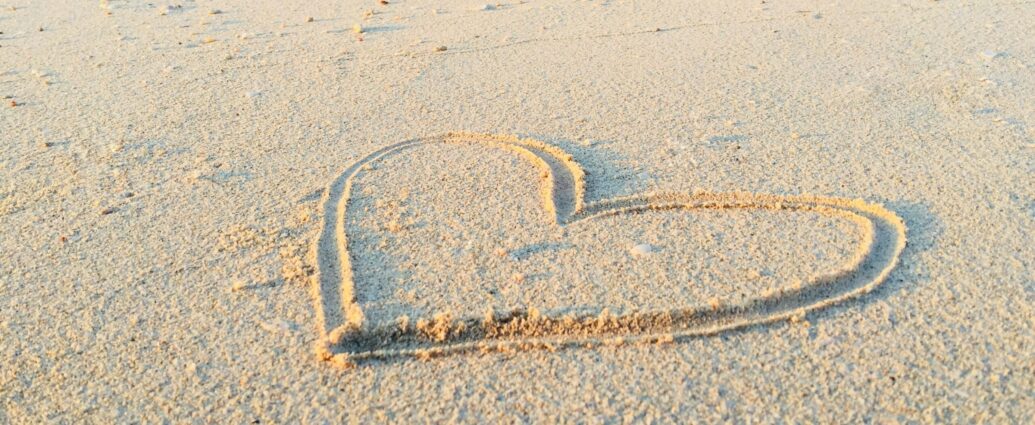 heart drawn in the sand