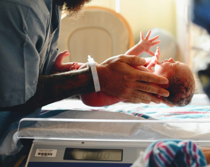 Image of newborn baby in hospital to represent the abortion law